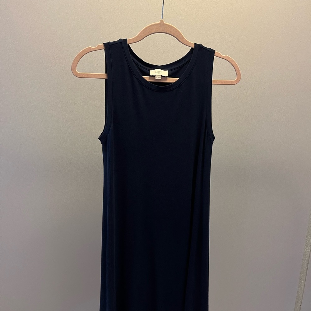 Loft size xs navy blue sleeveless dress. Knee length. Polyester & spandex blend.